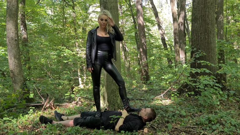 dirty boot  cleaning carpet slave in the woods